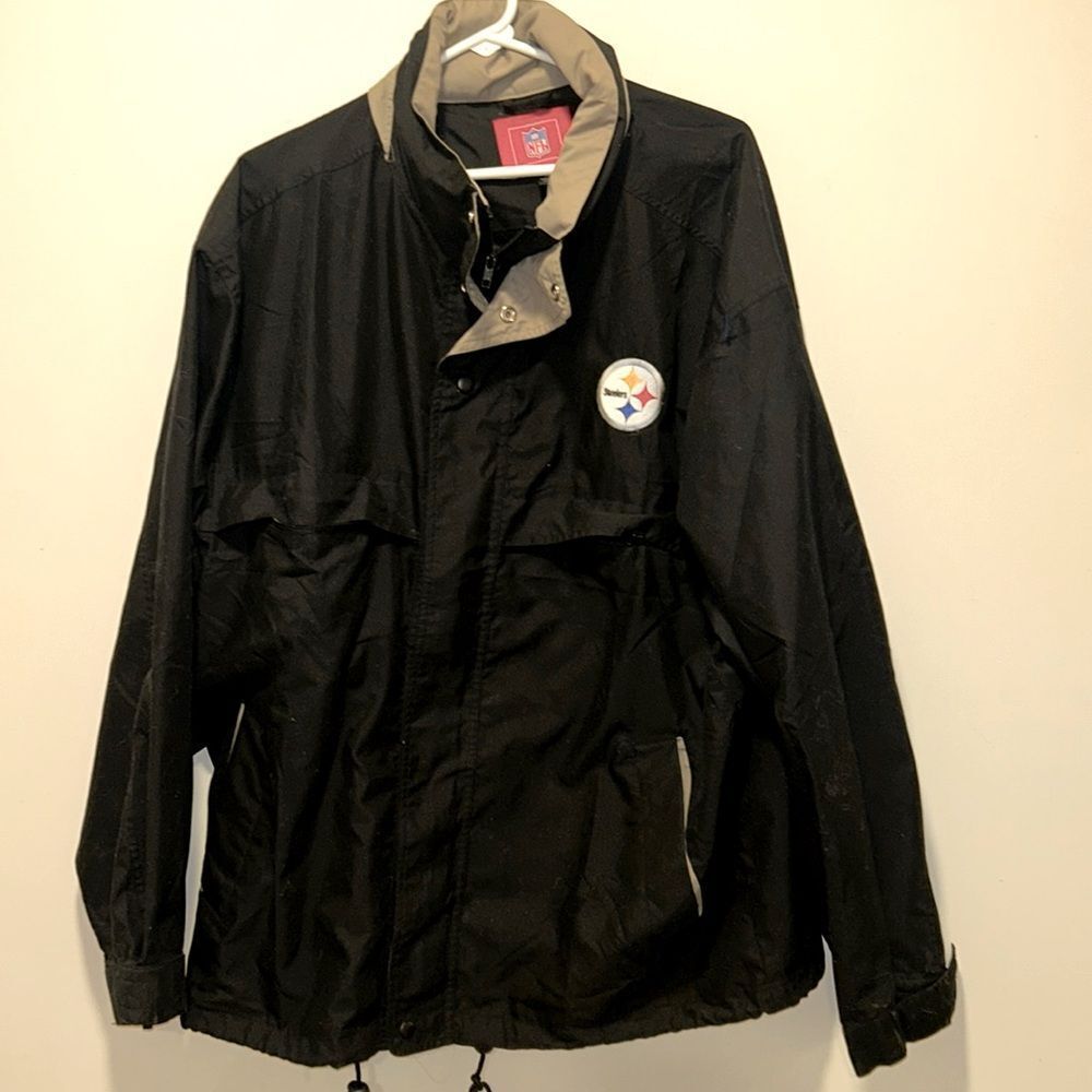 Pittsburgh Steelers zip up jacket. This windbreaker is washable and has hoody